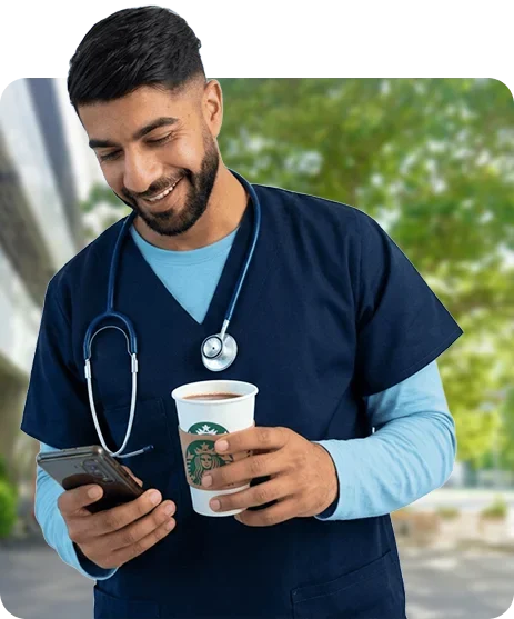 happy male nurse having a cup of coffee